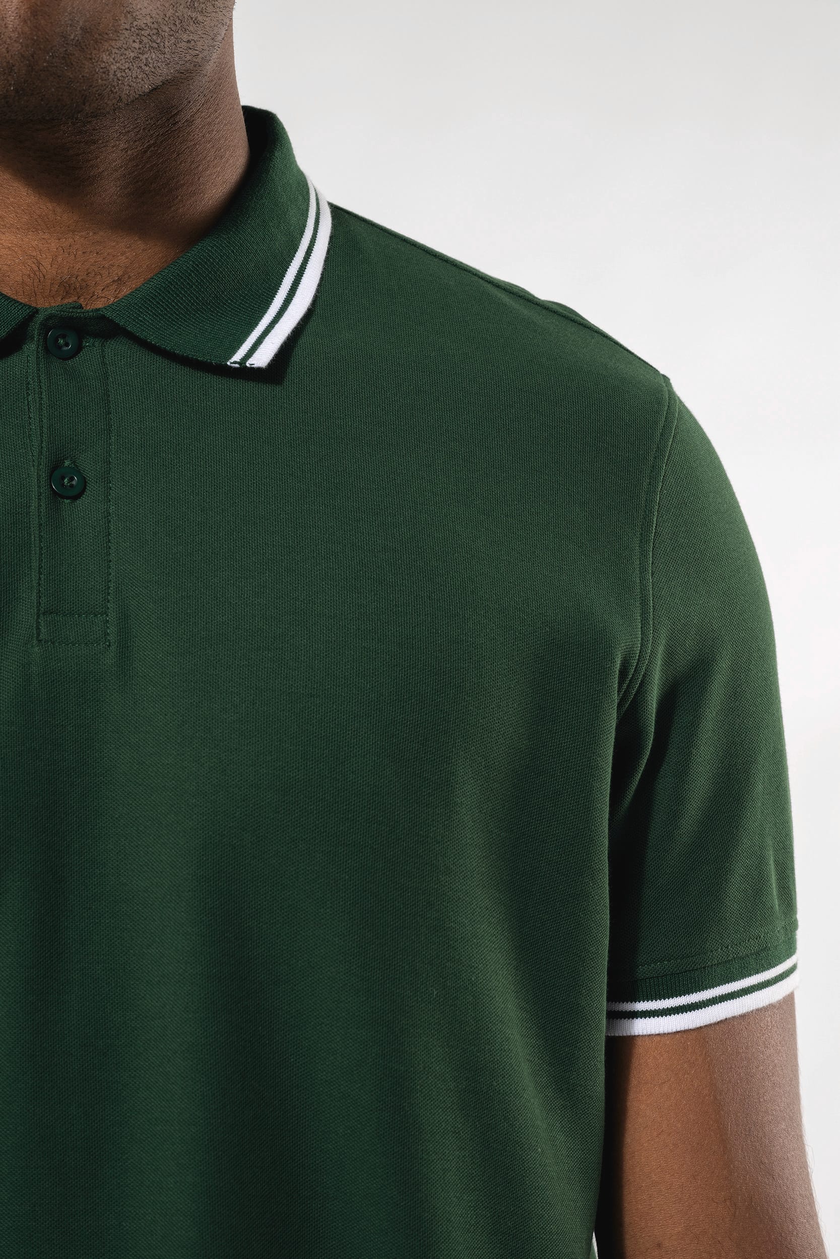 Polo Kariban com riscas em contraste